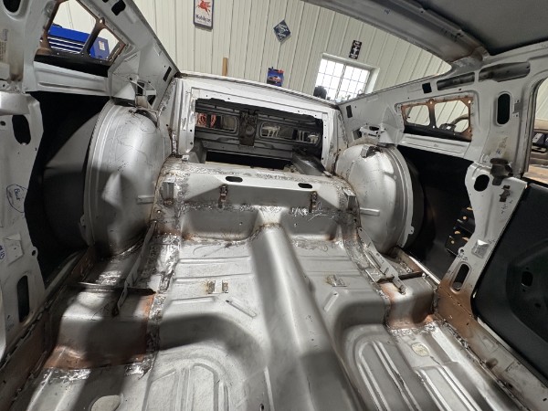 New floor pans and trunk floor installed in 1967 Mustang — complete body panel replacement